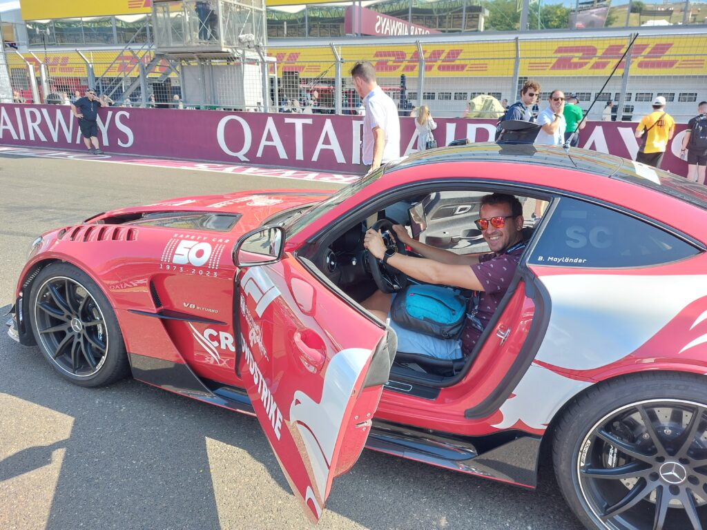 Ferry van Saalbach sits in a Formula 1 safety car.